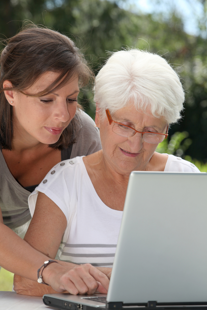 Senior using computer